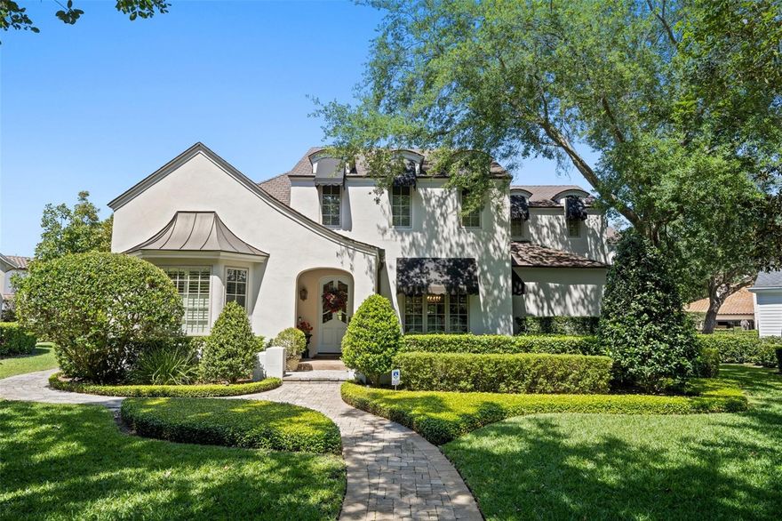 This exquisite French Country estate is a true masterpiece, boasting a grand total of 4900 square feet of luxurious living space. Located in the highly coveted Penn Place neighborhood and within walking distance to the lively shops and restaurants of Park Ave, this property offers the perfect combination of peaceful serenity and urban convenience.

Situated on a quiet cul-de-sac overlooking the park, this home boasts stunning curb appeal with a paver driveway leading to a three-car rear load garage. The first floor features high vaulted ceilings and gorgeous wood flooring, creating an inviting and warm atmosphere throughout. The gourmet kitchen is every chef's dream, complete with top-of-the-line appliances and custom cabinetry. Adjacent to the kitchen is the perfect space for hosting family dinners or entertaining guests.

The master suite, located on the first floor, offers a luxurious retreat with a large master bath, soaking tub, and separate shower. Upstairs, you'll find two separate quarters - one perfect for use as an in-law suite or game room, complete with an additional bedroom and bathroom. The other quarter features two bedrooms, one and a half bathrooms, and a private office.

Step outside and be transported to a tropical oasis, with lush and vibrant landscaping surrounding the property. The outdoor space features a beautiful pool and spa, perfect for relaxing or hosting outdoor gatherings. For golf enthusiasts, the backyard also boasts a putting green, allowing you to practice your swing in the comfort of your own home.

Don't miss your opportunity to own this one-of-a-kind property in the heart of Winter Park.