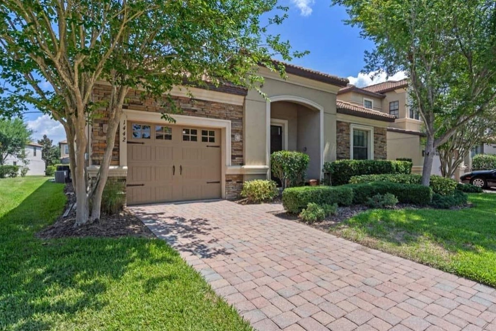 Photo of 1442 Moon Valley Drive, Davenport, FL 33896 (MLS # S5157056)