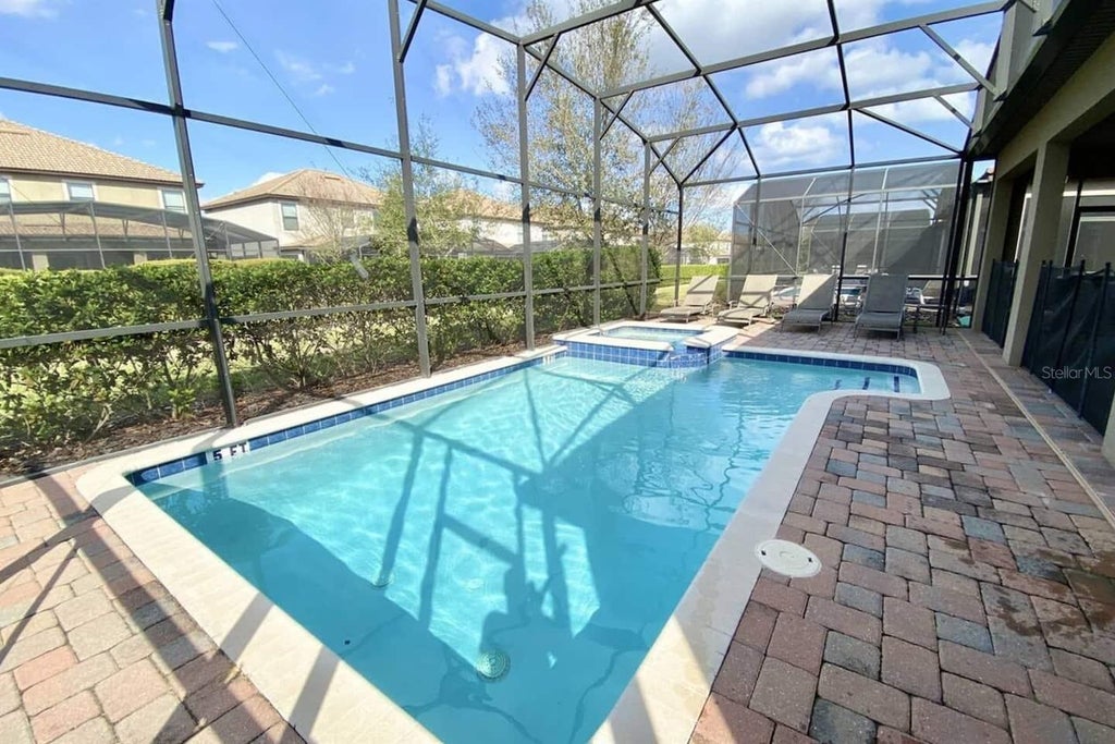 Photo of 1442 Moon Valley Drive, Davenport, FL 33896 (MLS # S5157056)