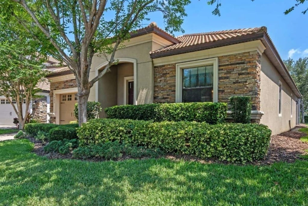Photo of 1442 Moon Valley Drive, Davenport, FL 33896 (MLS # S5157056)