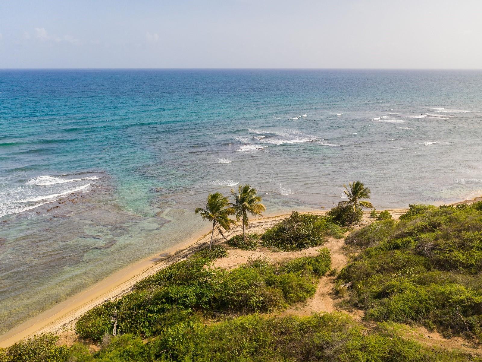 This ocean front acreage has a condominium construction project that was once permitted and could possibly be reinstated. The development provided for 66 units over 11 three story buildings with parking, two swimming pools and a restaurant with parking. The land is located on the Southern shore of Vieques in the exclusive La Hueca sector of Puerto Real.
The site is 11 acres over two parcels with approximately 300 feet of sandy beach ocean frontage.
This once in a lifetime opportunity is a must see and rare piece of sandy beach frontage.
For more information contact us at Bravos Boyz Real Estate and Property Management today.