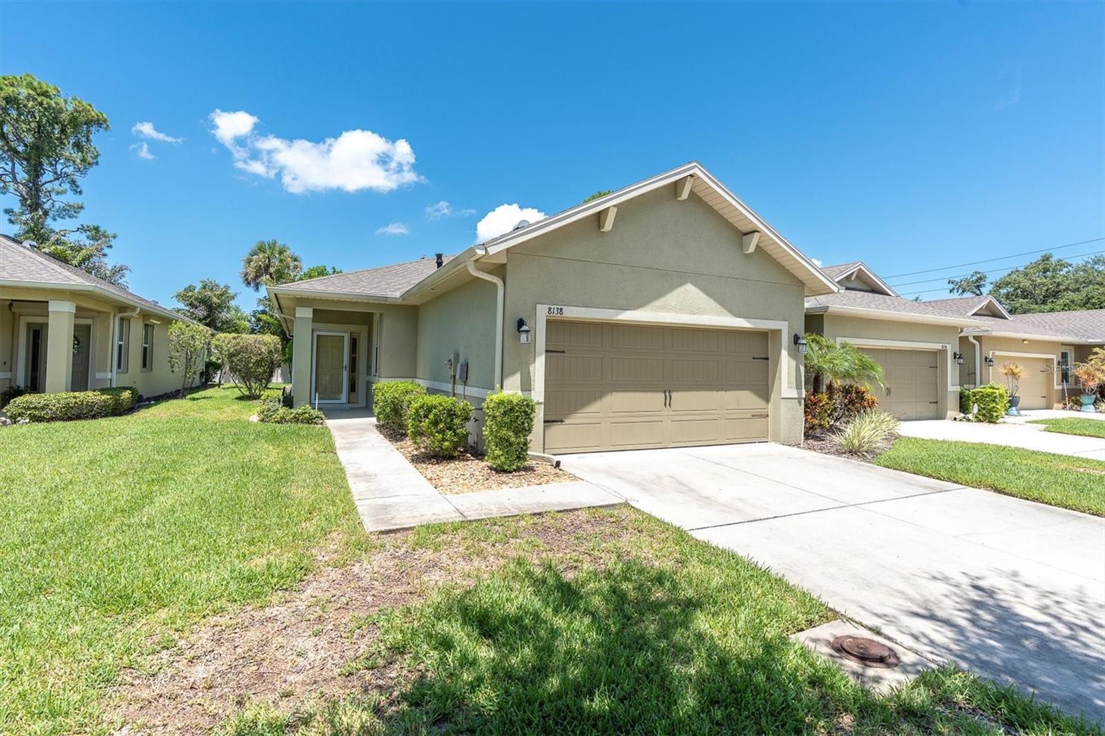 Welcome to Pine Crest Villas of Seminole, where modern comfort meets low-maintenance living in this beautifully upgraded end unit villa, built in 2017. Featuring 2 bedrooms, 2 full bathrooms, a dedicated office/den, and a spacious 2-car garage, this move-in ready home is packed with thoughtful upgrades and sits in a quiet, pet-friendly community with no age restrictions. Inside, you’ll love the light-filled, open-concept layout enhanced by the extra windows of this desirable end unit. The kitchen offers granite countertops, gas appliances, stainless steel finishes, closet pantry and a generous breakfast bar—ideal for entertaining or everyday meals. The primary suite is a private retreat with a walk-in closet with custom built in shelving, dual granite vanities, a spacious step-in shower, and motorized electric blinds for ultimate convenience and comfort. The second bedroom and guest bath are well-separated for privacy, and the office/den provides a quiet and flexible workspace or hobby room. Enjoy year-round outdoor living on the extended screened-in back patio, perfect for relaxing or entertaining guests in comfort and privacy. Additional standout features include:Low-E insulated windows with hurricane shutters for energy efficiency and peace of mind, gas appliances for efficient cooking and heating, Brand new Trane HVAC system installed in October 2024, Electric custom blinds in primary bedroom, 2-car garage and full-size interior laundry room, Low HOA fees that cover exterior maintenance, landscaping and irrigation, and Pet-friendly community with no age restrictions just to name a few. Centrally located with a short drive to top-rated beaches, Seminole City Center, shopping, dining, parks, easy access to airports, and more—this home offers the best of Florida living in a peaceful, well-kept neighborhood. Don’t miss this rare opportunity to own a modern, end-unit villa in Pine Crest Villas. Schedule your private showing today!