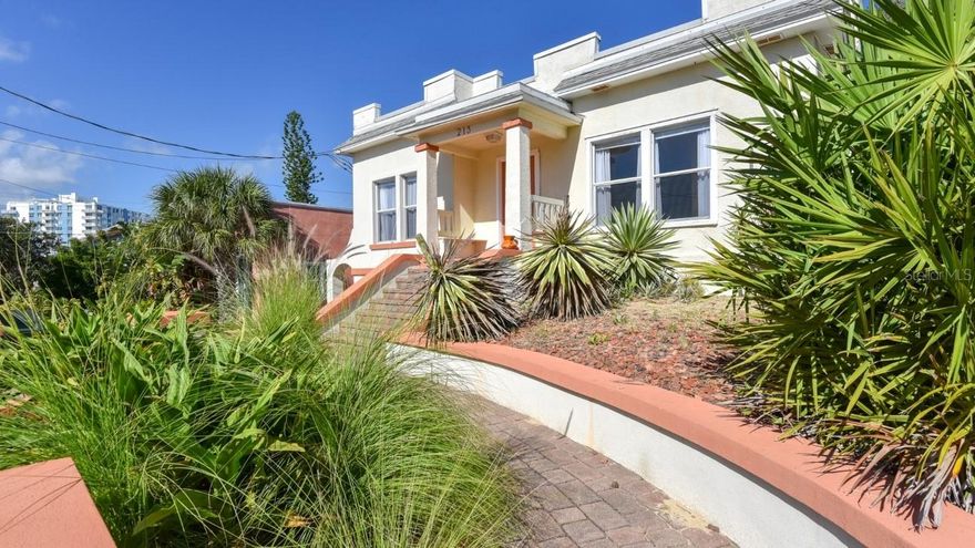 One or more photo(s) has been virtually staged. Step into timeless coastal charm with this fully furnished 1920s Art Deco/Mediterranean home located in the highly sought-after Seabreeze Historic District, perfectly positioned on Daytona's beachside peninsula between the Halifax River and the Atlantic Ocean. The main residence offers 3 bedrooms and 2 bathrooms with approximately 1,164 square feet of living space and 1,368 total under roof, blending historic character with thoughtful modern updates. A separate 1-bedroom, 1-bath guest efficiency of approximately 504 square feet features its own private entrance along with a washer and dryer, making it ideal as an income-producing opportunity, mother-in-law suite, or multi-generational living setup. This property is being offered fully furnished and features a roof replaced approximately 2017-2018 and a 4-ton HVAC system replaced in 2023. Interior highlights include real wood flooring, a wood-burning fireplace, an open layout, and French doors leading to the patio. The kitchen offers

a spacious design with a flat-top cooktop, stainless steel appliances, and ample cabinetry.

The primary suite is bright and airy with double windows, barn-style doors, and a full bathroom with tub and shower.

Outdoor living includes a furnished patio with a BBQ grill, dual yard access, and a charming paver driveway with a classic Art Deco front staircase featuring built-in benches that reflect the home's historic character.

Nightly rentals are not permitted; however, 6-12 month leases are allowed with required city registration. The owner must occupy one of the spaces either part-time or full-time, and both units cannot be rented simultaneously.

Located just moments from both the beach and the river, this home is close to dining, cafés, nightlife, golf courses, and local attractions including the Daytona Playhouse and Hyde Park Prime Steakhouse. The Seabreeze Historic District offers authentic character that cannot be recreated and continues to grow in appeal, with a major streetscape enhancement underway including new sidewalks, lighting, landscaping, and improved traffic flow. Schedule your private tour today.