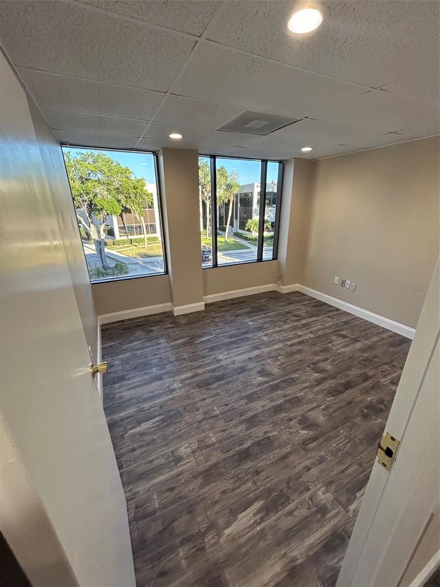 ONE CARROLLWOOD PLACE A CONDOM - Commercial Lease