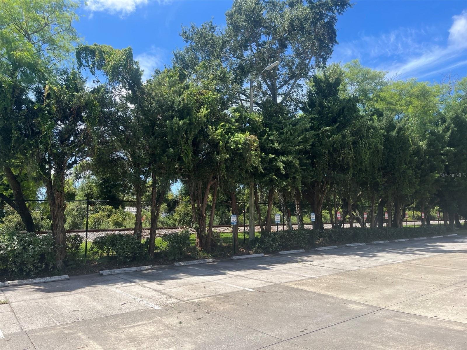 ONE CARROLLWOOD PLACE A CONDOM - Commercial Lease