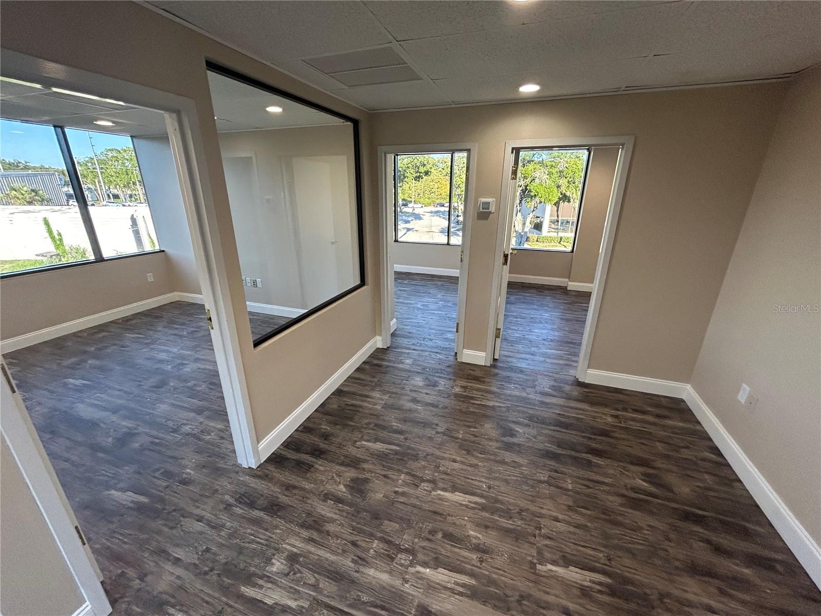 ONE CARROLLWOOD PLACE A CONDOM - Commercial Lease