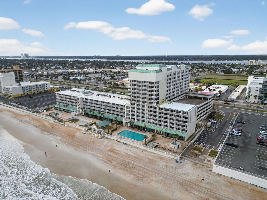 Public Remarks: Prime Investment Opportunity. This 339 sq ft completely furnished oceanfront condo studio offers great views, new flooring, and income potential. This unit is enrolled in a rental program and is generating transferable passive income while allowing the owner to enjoy personal use whenever they like. The studio features a queen bed, a sitting area with a queen sleeper sofa, a kitchenette, and a functional bathroom. Guests will love the beachfront location, perfect for activities like paddleboarding, surfing, and relaxing on the sand. Located just one-half mile from Andy Romano Beachfront Park, it offers easy access to picnic areas, a splash pad, and family-friendly fun. This property is always in demand with nearby dining, shopping, and entertainment. Resort amenities, including indoor and out door pools, sauna, hot tubs, and gym are open. Invest in oceanfront living—your opportunity awaits!