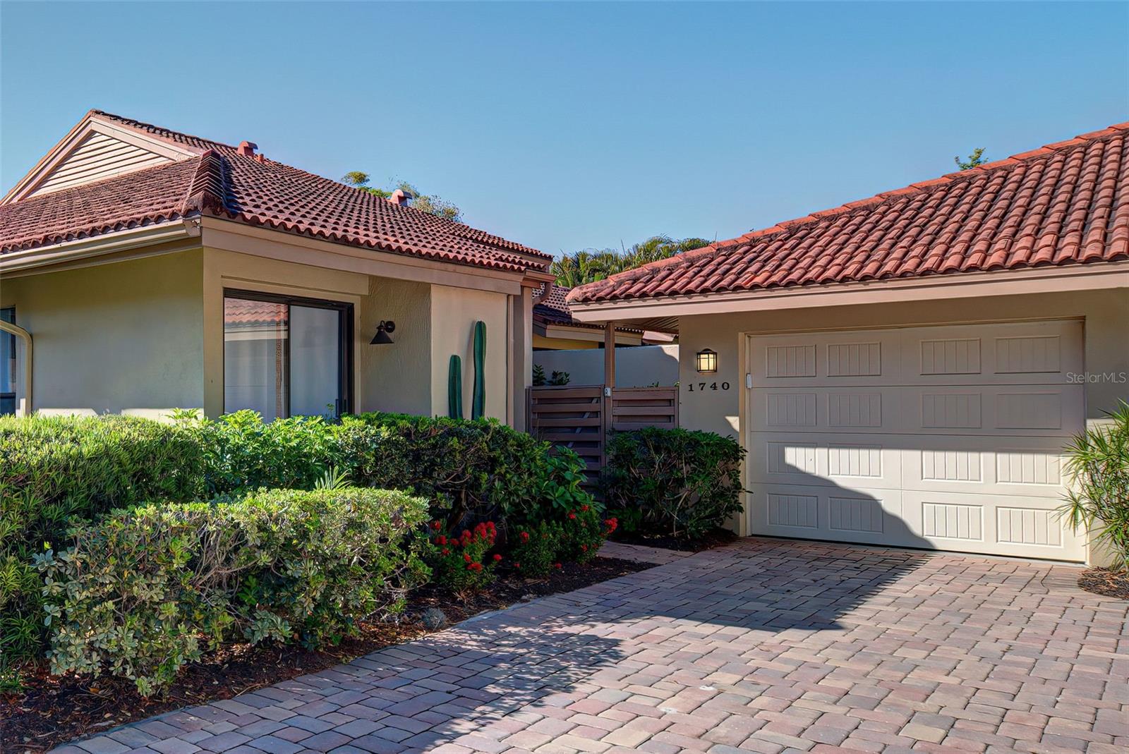 Welcome to the gated community of the Landings and the Landings Racquet Club in Sarasota.
Currently available off-season starting May 15, 2025 at 3000/mo.
Association rules allow 2 rentals in a calendar year. A rare find to lease this beautiful carriage house condo at The Landings! This two bedroom, two bath +den, one story Carriage House is where you want to be! Bed sizes are King and Queen. The large living room has designer tile flooring, marble wood burning fireplace, crown molding and park like views leading to a small pond with a fountain and the community pool. The dining area overlooks the living room with new floor tile, crown molding and plenty of room for family gatherings. The sunny bonus room off the dining area is set up as an office with 2 desks and a sofa sleeper for extra company. The master suite has a King bed with newer carpeting, shutters, crown molding, walk-in closet and a remodeled bathroom. The guest bedroom has a Queen bed and the guest bathroom has a tub and shower combination. The eat in kitchen has granite counter tops, tile backsplash, refaced cabinets and all new Whirlpool appliances. There is a delightful small courtyard perfect for morning coffee or outside grilling. There also two outside sitting areas off the Living and master bedroom to enjoy the calm and peaceful views. The Landings Racquet Club membership transfers to the guests. Tennis players will love the Har-Tru tennis courts, and guests will get a good work-out in the lap pool. Relax in the hot tub to soothe sore muscles. The clubhouse has a fitness center, meeting rooms and a library. Guests pay the monthly electric bill on off-season rentals. Off-season rate in effect from May-November. Not available January 1 - April 30, 2026.