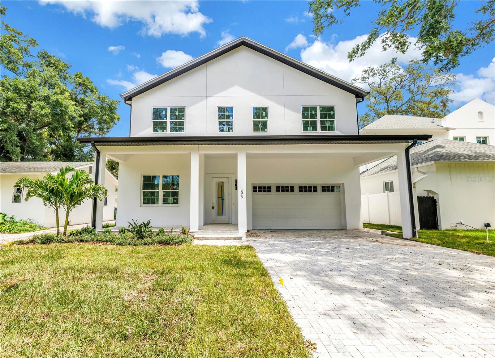 Under Construction. Welcome to this stunning new construction home (estimated completion in October 2025) located in one of the most desirable and quaint neighborhoods in all of St. Petersburg, Allendale. As you enter the neighborhood, you are greeted by mature trees lining the streets, perfectly manicured landscaping, and a sense of serenity.
This home features 5 spacious bedrooms, 4.5 bathrooms, a 2 car garage, and more than 3,200 square feet of heated living space. The first floor open-concept floor plan is perfect for entertaining and hosting gatherings with friends and family. Sliders to the back porch and backyard allow for ample sunlight throughout the living room, kitchen, and dining area, and provide seamless indoor and outdoor living.
The home has been thoughtfully designed for functionality, with a large bedroom and en suite bathroom on the ground floor, a second-floor laundry room, and a spacious primary suite complete with dual walk-in closets, dual vanities, and dual shower heads.
The central location of Allendale should not be overlooked, as you are just minutes from the vibrant shopping, arts, and dining scene of downtown St. Pete, a short 20-minute drive to Tampa International Airport, and only 20 minutes from our world-renowned beaches along the Gulf.