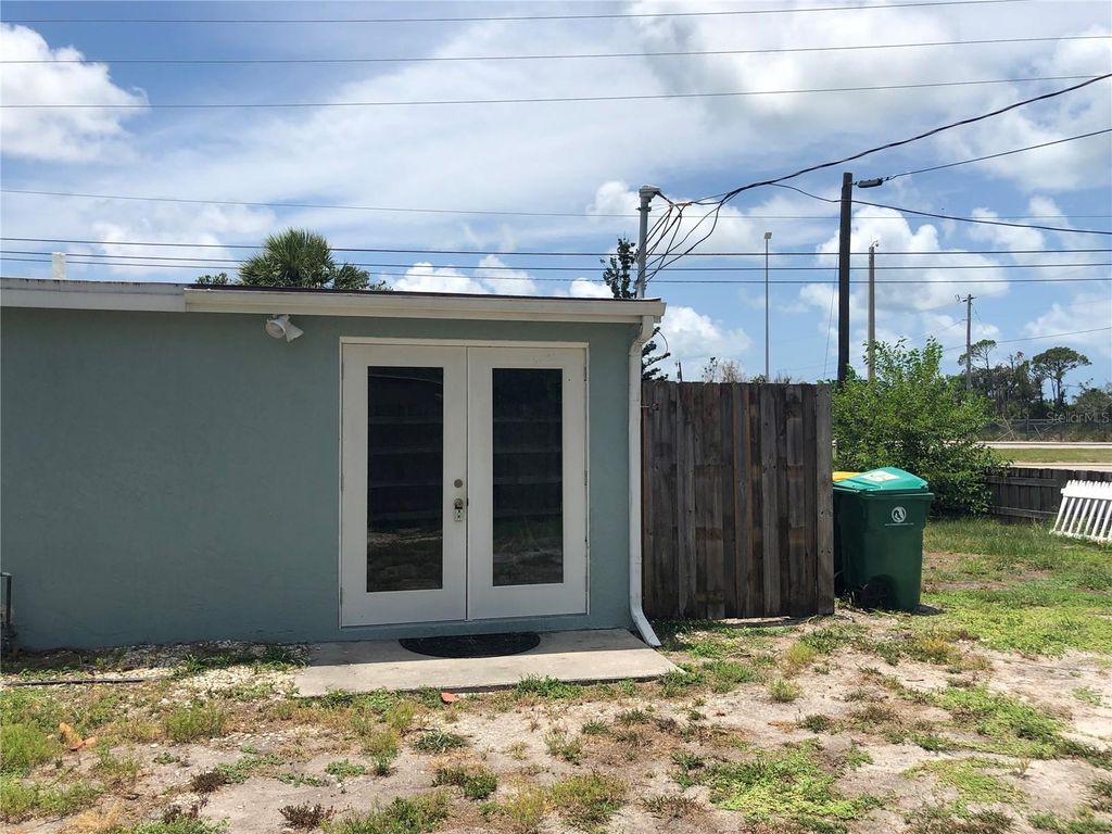 Photo of 1395 Sharlo Lane, Englewood, FL 34224 (MLS # A4678399)