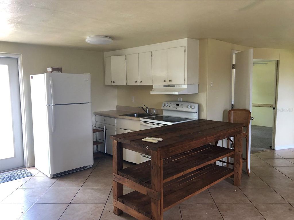 Photo of 1395 Sharlo Lane, Englewood, FL 34224 (MLS # A4678399)