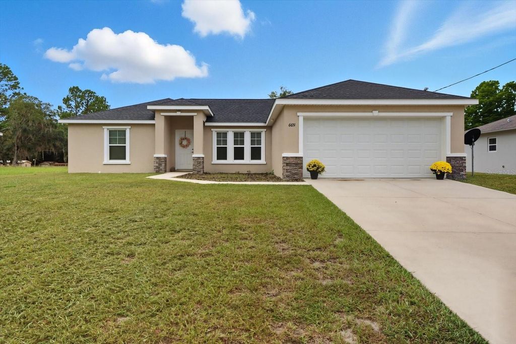 Photo of 6651 SW 151st Loop, Ocala, FL 34473 (MLS # OM710590)