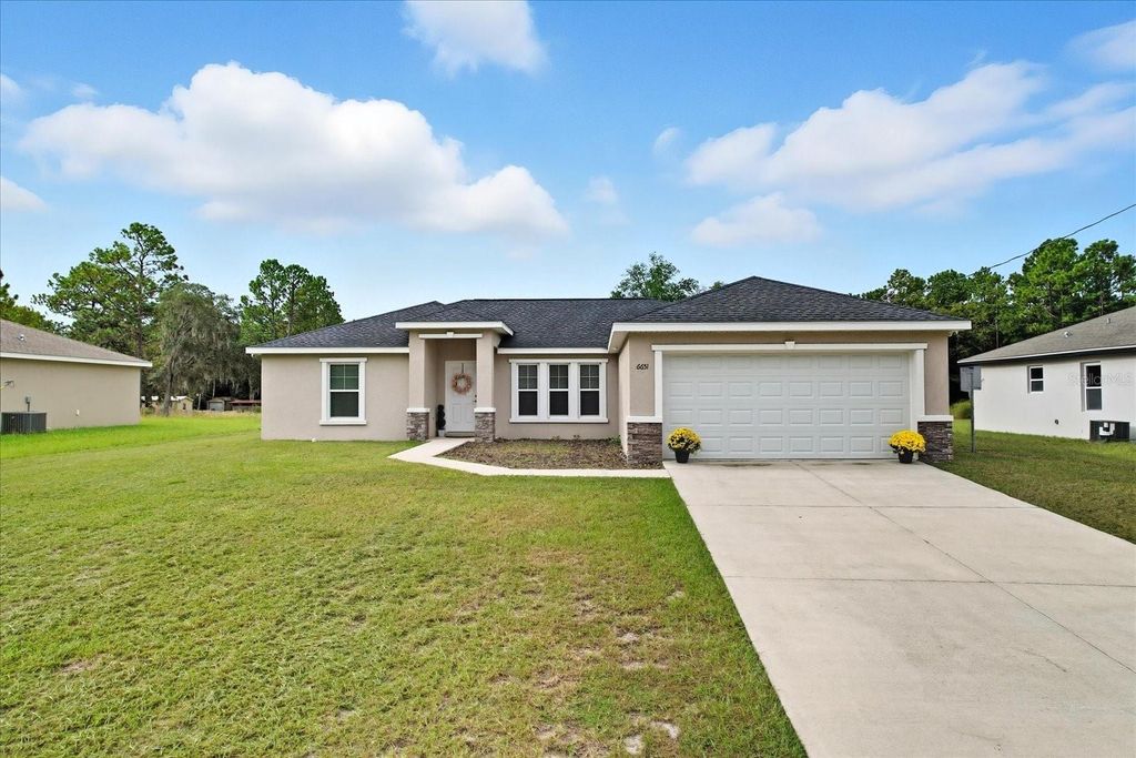 Photo of 6651 SW 151st Loop, Ocala, FL 34473 (MLS # OM710590)