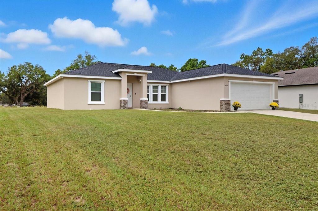 Photo of 6651 SW 151st Loop, Ocala, FL 34473 (MLS # OM710590)