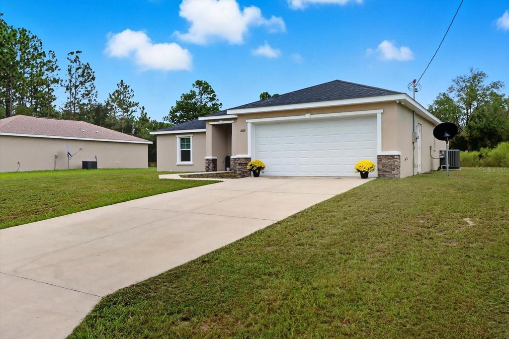 Photo of 6651 SW 151st Loop, Ocala, FL 34473 (MLS # OM710590)