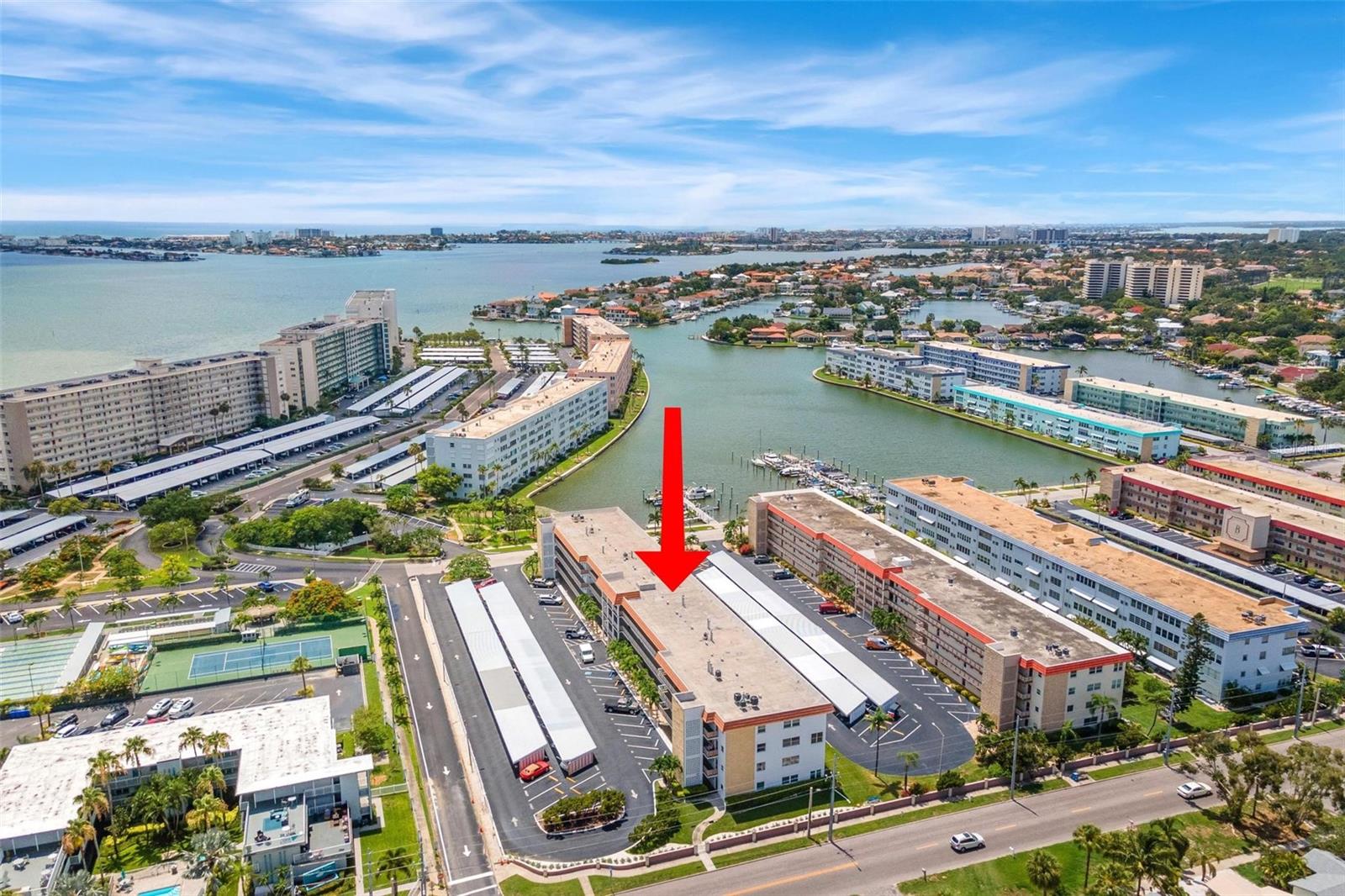 This beautiful condo for rent in the ETON building at Gulfport beach offers a comfortable and spacious living space of 1060 sq ft. The interior features white appliances, honey oak cabinets, and black granite countertops, creating a modern and stylish look. With water views from both the front and back of the condo, you can enjoy the tranquil atmosphere and scenic surroundings. The primary bedroom includes a convenient walk-in closet, providing ample storage space. The community offers various amenities for an active lifestyle, including swinging benches overlooking the water, shuffleboard, a gym, community pools, a pool hall, a library, a rec center, and a game room. For outdoor enthusiasts, there are boat docks, tennis and pickleball courts, and Gulfport beach is just a stone's throw away. From the condo, you can see the sand volleyball courts, skate park, Gulfport casino, fishing dock, and a variety of restaurants and shops, making it a perfect location for entertainment and recreation. The HOA takes care of cable, internet, gas, sewer, water, and trash, providing convenience and peace of mind. Don't miss out on the opportunity to rent this stunning condo in a vibrant and desirable community. Optionally furnished