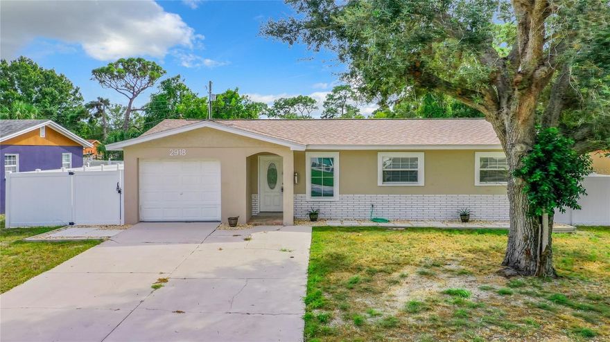 Fully remodeled BLOCK HOME with 3 bedrooms, 2 bathrooms, garage, large fenced yard and more! This fantastic property is situated on a quiet street just blocks from the new Skyway Marina District with easy access to the highway. Pulling up, you will notice the large shade tree and great curb appeal of this freshly painted home. Fully remodeled in 2023 with NEW roof, NEW HVAC, NEW impact windows, NEW LVP flooring, NEW bathrooms, NEW electric, NEW tankless water heater, NEW kitchen, FRESH interior and exterior paint and NEW landscaping! Opening the front door, your eyes will be drawn through the open living/dining room to a large flex space at the back of the home. To the right are three generous sized bedrooms and two full bathrooms, completely remodeled. The master suite includes a large bedroom and ensuite bath. To the left is a spacious garage with laundry hookups and access to the side yard. The kitchen sits in the middle of the home with all new appliances, cabinets and granite counters. Out back is a large fenced yard with new landscaping around the home.