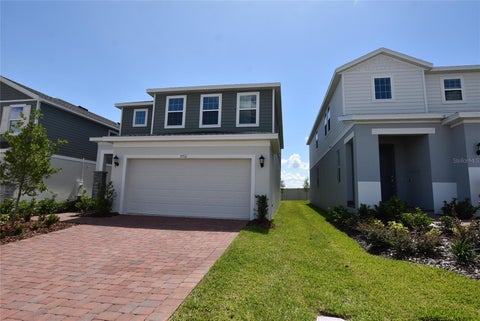 Photo of 7731 Trapani Loop, Clermont, FL 34714 (MLS # O6424683)