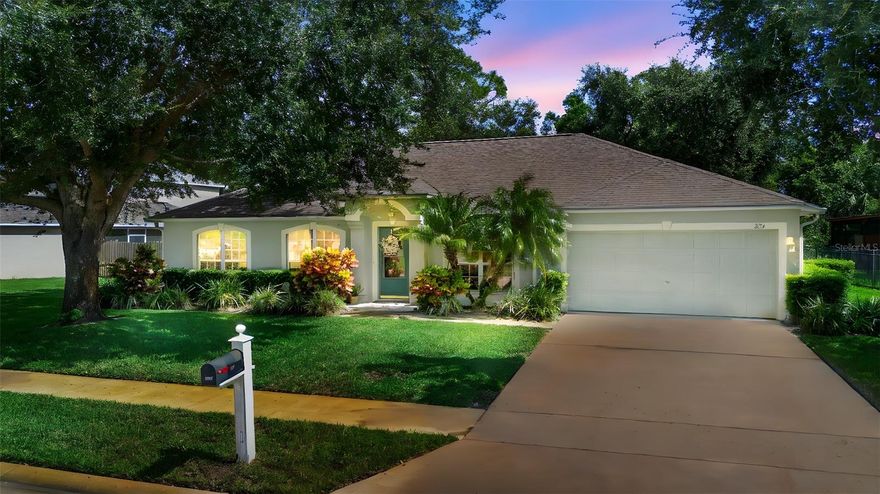 PRICE IMPROVEMENT!! Welcome to Chuluota’s Estates at the Trails! Your search is over: LOW HOA, NEW ROOF, NEW AC, and Mature landscaping, well-maintained single-story 4 bedroom, 2 bath, 2 car garage home is located on a peaceful conservation lakefront lot with no back neighbors. As you walk into the home you are welcomed by a beautiful open space with 10-foot-high ceilings.  The formal living and dining spaces are well arranged in this split-floor plan. Through the foyer, you will enter a spacious great room, a family room to the left, and the kitchen to your right. The kitchen features an island with an additional sink (ideal for prepping meals), pull-out drawers, a lot of counter space and storage with an eat-in area. Off the great room to the left, is the spacious primary suite, his and her walk-in closets, double sinks, a garden tub, and a separate shower. Off the great room is a hallway with your three secondary bedrooms and one other bath. Exit out the sliding glass doors off your kitchen nook and walk out onto your covered patio perfect for your outdoor family entertainment. You can sip your morning coffee surrounded by mature trees and natural beauty all year around! For extra peace of mind, the electrical panel is equipped with a generator plug-in. You are near shopping, walking trails, parks, restaurants, Seminole County Schools, and UCF. Make it yours- Schedule your showing today!