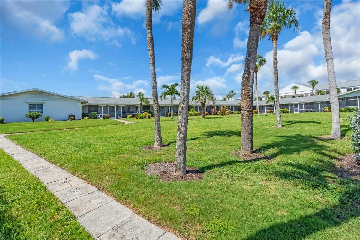Coastal Retreat Near Venice Beach** Discover your perfect slice of paradise with this charming 2-bedroom, 2-bath condo, ideally located just steps away from the serene shores of Venice Beach. Imagine unwinding on your private lanai, listening to the gentle waves of the Gulf. This delightful home features tile and laminate flooring throughout. The spacious primary suite boasts two closets and an en suite bathroom complete with a walk-in shower. Both the guest bedroom and the primary suite are adorned with elegant Plantation shutters, combining style with functionality. The well-appointed kitchen offers ample storage and overlooks the expansive heated pool area, conveniently accessible directly from your back door and patio. The living and dining areas provide generous space, ensuring plenty of room for entertaining or relaxation, while additional storage throughout the unit adds to its practicality. And for added peace of mind, this unit has all impact window and doors. Located in a vibrant 55+ community, this condo is just a short stroll or a leisurely bike ride to downtown Venice, the popular Crow's Nest, and the picturesque South Jetty. Don’t miss out on this incredible opportunity to witness breathtaking sunsets from your lanai. Call today to schedule your private showing and step into your dream coastal lifestyle!