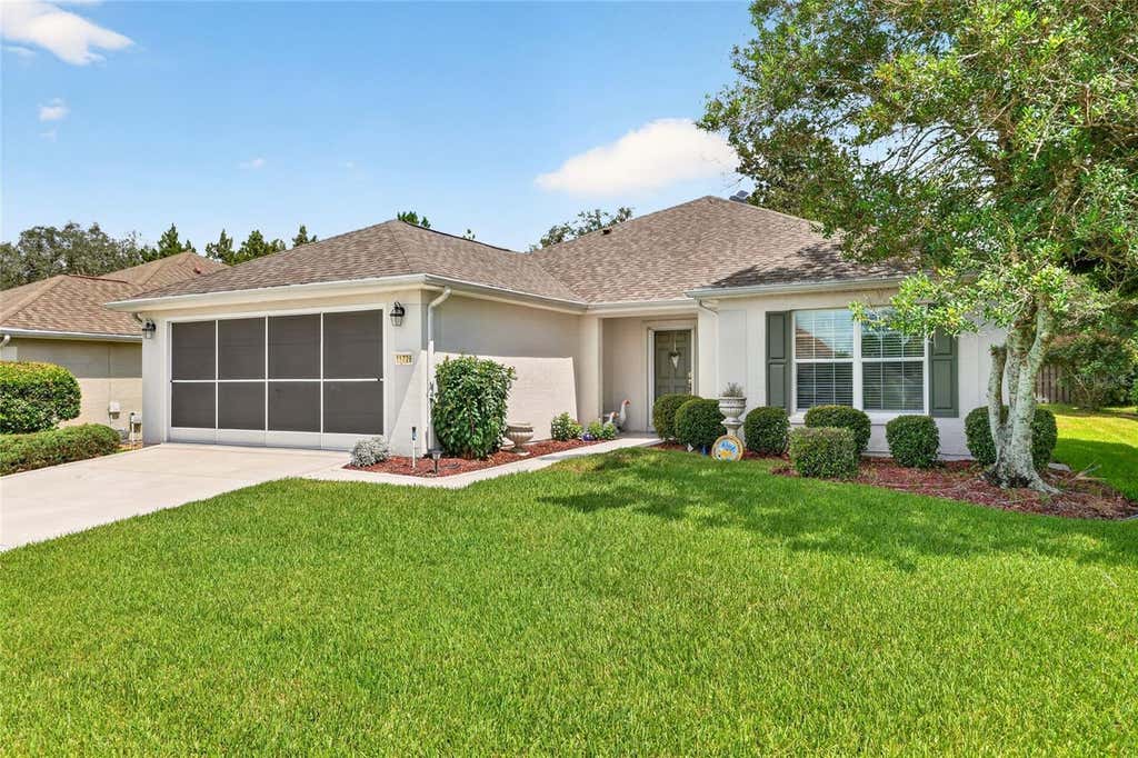 Photo of 11728 SE 91st Circle, Summerfield, FL 34491 (MLS # OM730860)