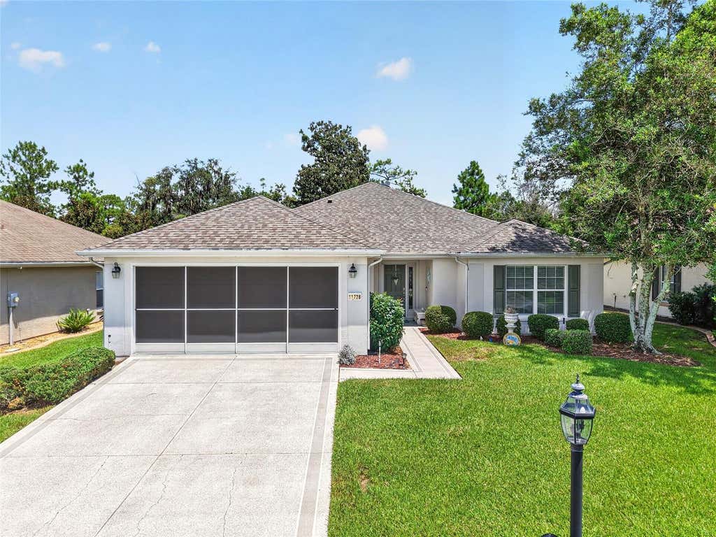 Photo of 11728 SE 91st Circle, Summerfield, FL 34491 (MLS # OM730860)