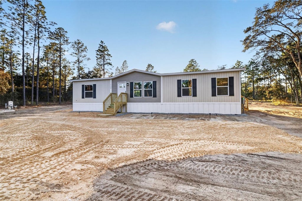 Photo of 170 NE 138th Avenue, Williston, FL 32696 (MLS # OM734530)
