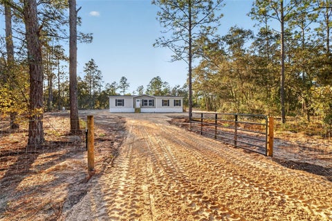 Photo of 170 NE 138th Avenue, Williston, FL 32696 (MLS # OM734530)