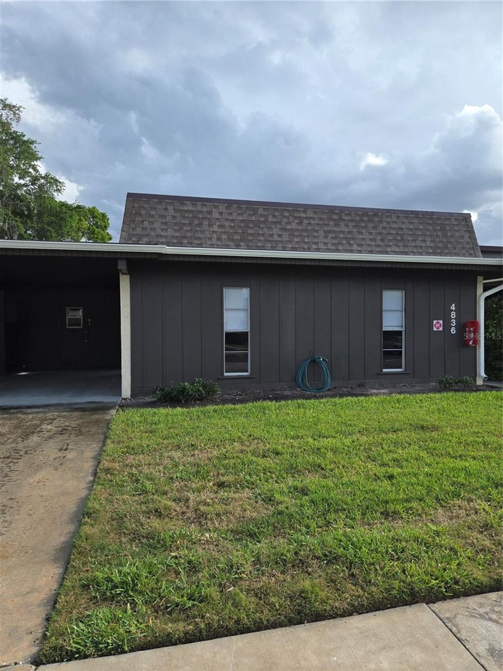 Photo of 4836 Onyx Lane #B, New Port Richey, FL 34652 (MLS # TB8491620)