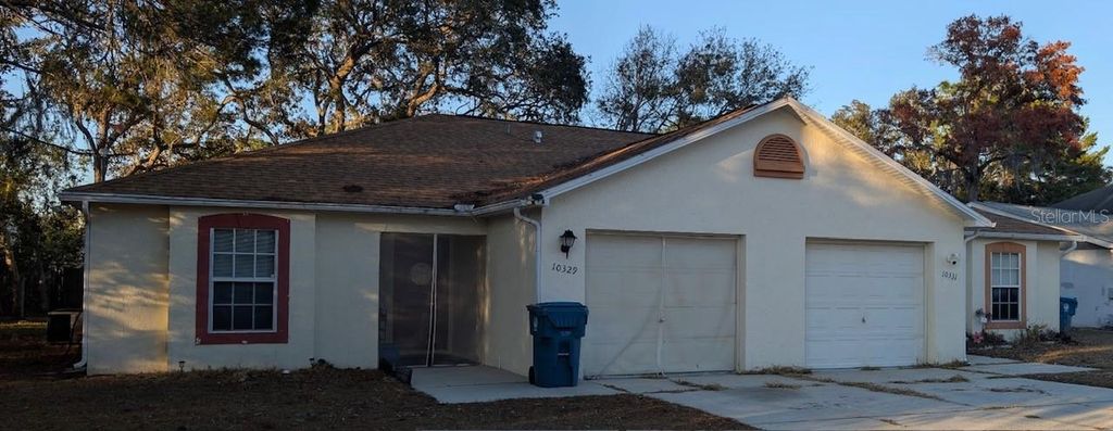 Photo of 10329 Usher Street, Spring Hill, FL 34608 (MLS # TB8472644)