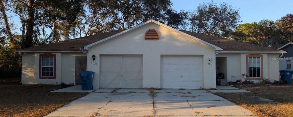 Photo of 10329 Usher Street, Spring Hill, FL 34608 (MLS # TB8472644)