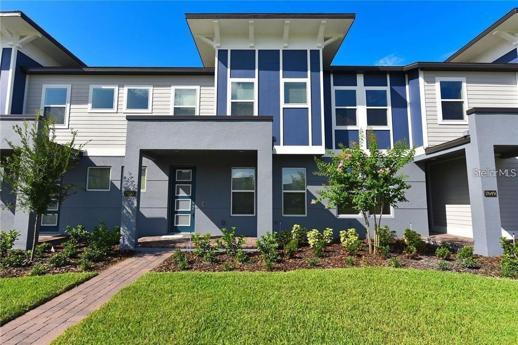 Photo of 7055 Carrickbend Lane, Orlando, FL 32819 (MLS # O6403728)