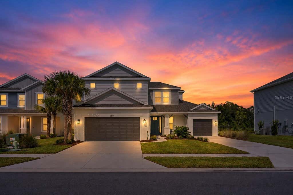 Photo of 33734 Landsman Loop, Wesley Chapel, FL 33543 (MLS # TB8539891)