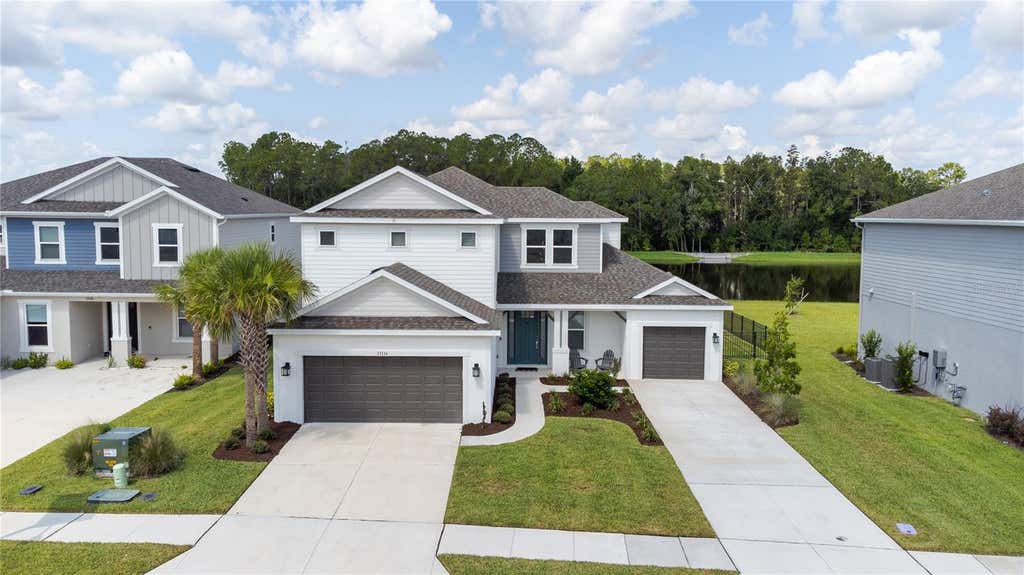 Photo of 33734 Landsman Loop, Wesley Chapel, FL 33543 (MLS # TB8539891)