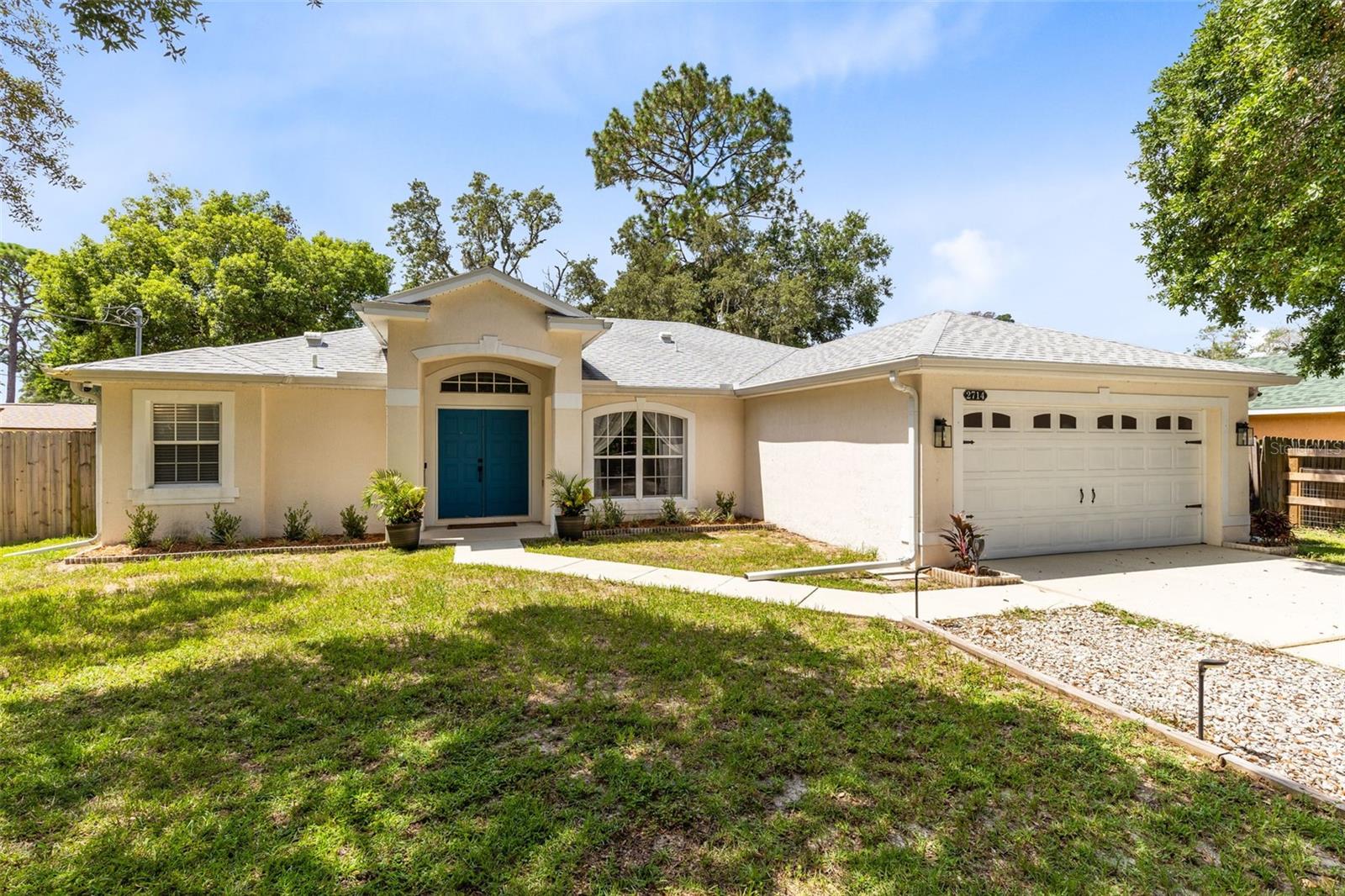 Welcome to this meticulously maintained 3-bedroom, 2-bathroom home nestled in the quiet neighborhood of Mendelin Estates in Apopka. This conveniently laid out, split floor plan residence sits on almost a quarter acre with a beautiful fenced in backyard with mature oak trees and new landscaping. Step outside and enjoy the fresh air from the spacious screened-in patio—ideal for relaxing mornings or bug-free evenings. Just beyond, a nice sized deck provides the perfect space for entertaining, grilling, or soaking up the sun in your private backyard oasis. Upon entering you will immediately notice the bright, inviting interior. You will fall in love with the open floor plan, which includes a central kitchen with a breakfast nook, spacious living room and separate formal dining room. You will appreciate all the fine details including the vaulted ceilings in the main living area and tray ceiling in the primary bedroom. Recent upgrades provide peace of mind, including a NEW Energy star certified roof (2023), Energy star certified hot water heater (2023), 3 ton Trane XR14 heat pump system A/C with smart home thermostat (2023), New well pump and water softner system (2023), new back deck (2022), Primary bathroom with two walk in closets, renovated (2025), LPV flooring installed in kitchen and laundry room (2025), LED can lighting added throughout the home (2025), new ceiling fans (2025), stainless steel appliances (2022) . Location is everything, and this home delivers! You are just moments away from everything you need. Enjoy easy access to SR 436, making commutes a breeze to Apopka, Altamonte Springs, and beyond. Nature lovers will rejoice with the proximity to Wekiva Springs State Park, offering endless opportunities for outdoor adventure. Dining, shopping, and entertainment options are at your fingertips. Don't miss your chance to own this incredible home.