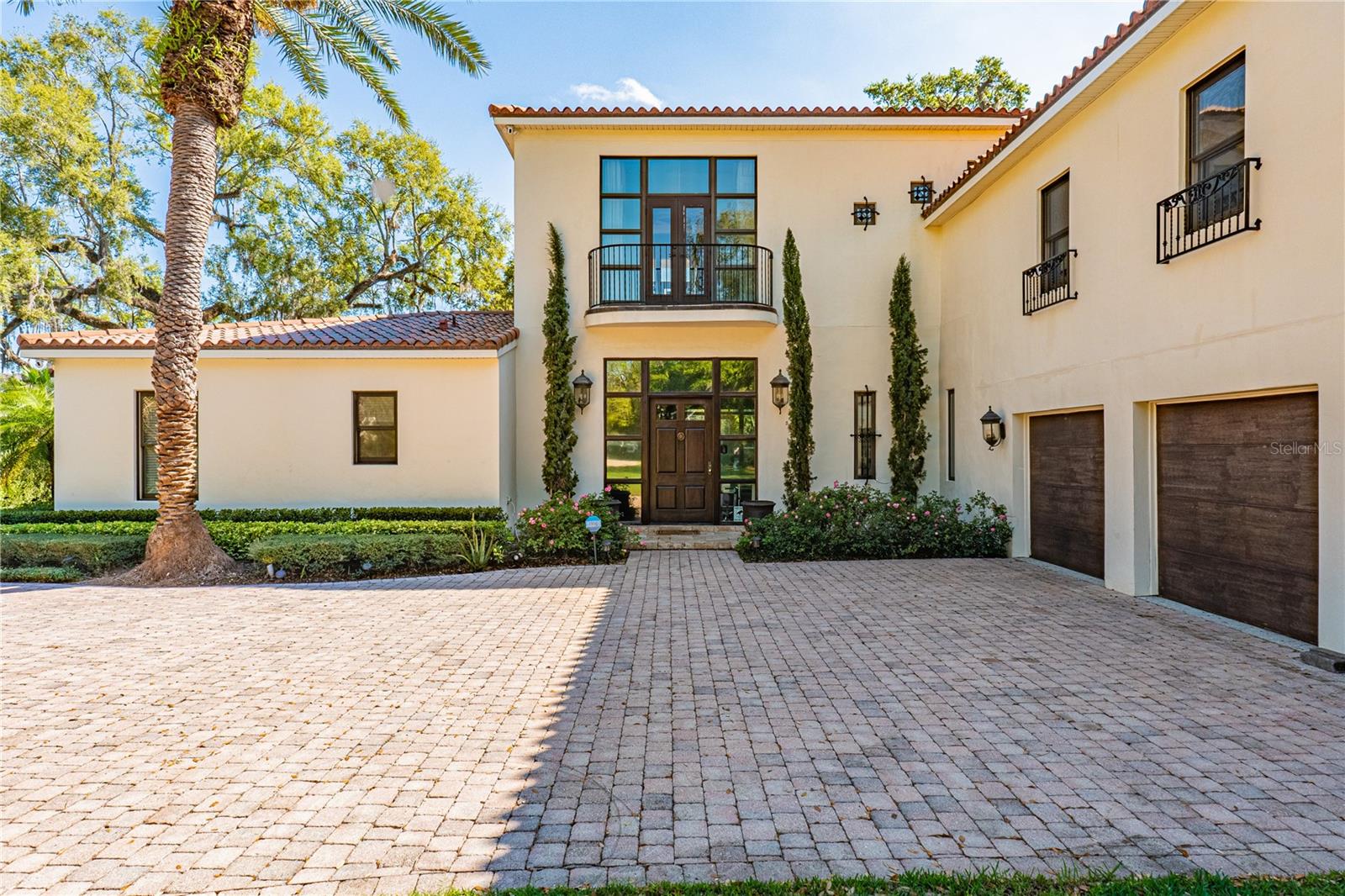 WINTER PARK CHAIN OF LAKES! This AMAZING LAKE HOUSE is situated just minutes away from the Charming and Historic Winter Park Avenue and walking distance to Rollins College and is set on 1.70 ACRES of land with nearly 200 feet of lake frontage. Enjoy the beautiful and highly sought after Lake Mizell, which accesses all the other lakes on the Winter Park Chain. This uniquely rare property features a lovely long and windy driveway lined with pavers. As you begin approaching The Estate you will feel swept away by its Mediterranean Charm. A gorgeous solid Oak door sits right below the Juliet Balcony that comes off of the Primary Bedroom Suite. The amazing backyard oasis is in an ultra private setting boasting breathtaking mature Oak Trees, lush landscaping, a fabulous pool area. This backyard is truly immense and perfect serene setting for entertaining friends and family, hosting parties, ceremonies, events, holidays and more. 5 Large Bedrooms, 5 Full bathrooms, and bonus upstairs living room area. This property has it all, and is in one of the MOST DESIRABLE AREAS IN ALL OF CENTRAL FLORIDA! Centrally located, shopping, restaurants, local farmers market, entertainment, boutiques, museums, outdoor parks, nearby highway for commuting. *SCHEDULE SHOWING TODAY* MAKE AN OFFER*