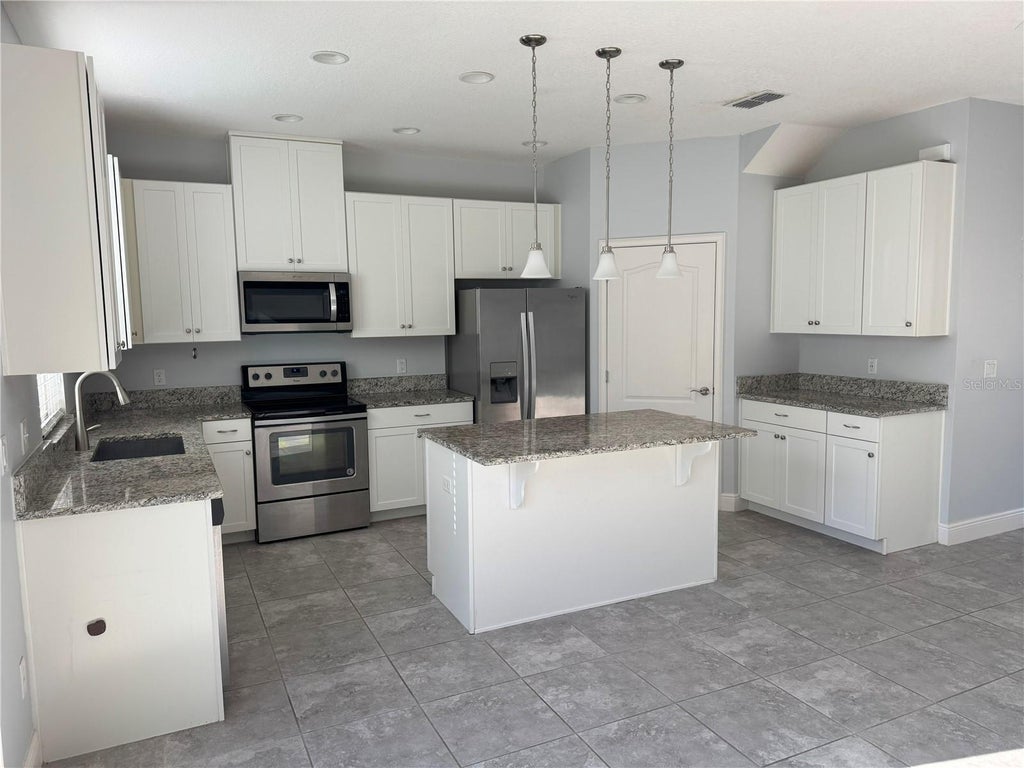 Photo of 13963 Arclid Street, Orlando, FL 32832 (MLS # O6414381)
