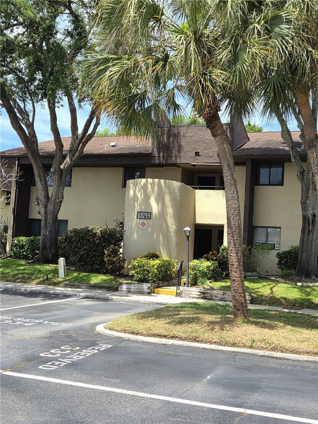 Photo of 10755 Village Club Circle N #101, St Petersburg, FL 33716 (MLS # TB8497993)