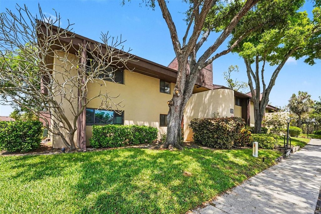 Photo of 10755 Village Club Circle N #101, St Petersburg, FL 33716 (MLS # TB8497993)