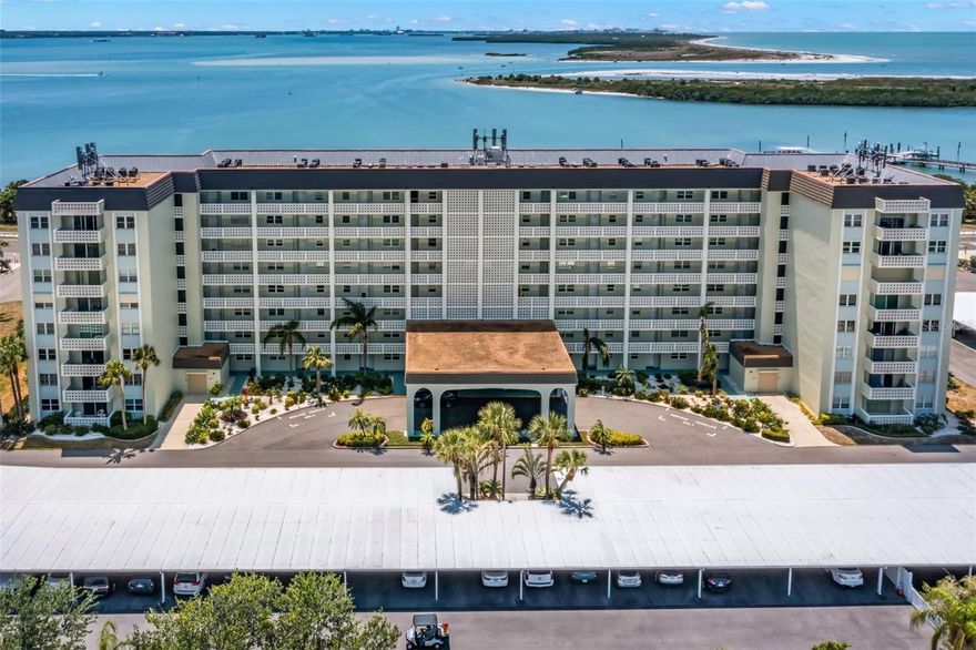 Welcome to your own slice of coastal paradise on the highly sought-after Dunedin Causeway—where every day feels like a vacation and the water is always within view. Perched on an upper floor, this beautifully updated 1-bedroom, 1-bath condo offers sweeping water views that instantly create a sense of calm the moment you walk through the door. Imagine starting your mornings with coffee on your private balcony, watching the sun shimmer across the water, and ending your evenings with breathtaking sunsets and gentle coastal breezes. The thoughtfully updated kitchen features stone countertops, soft-close white shaker cabinetry, and an open layout that flows seamlessly into the living and dining areas—perfect for quiet nights in or hosting visiting friends and family. No matter where you are, the water remains the focal point. The bright and airy living space opens through floor-to-ceiling sliding glass doors to your balcony retreat—an ideal place to relax, read, or simply take in the peaceful surroundings. There’s even additional storage for all your beach and outdoor essentials. The spacious bedroom continues the tranquil theme with beautiful water views, creating a restful retreat at the end of each day. A large walk-in closet, updated luxury vinyl wood-look flooring, and a well-appointed bathroom with ample storage and a step-in shower add comfort and convenience throughout. Beyond your front door, enjoy a welcoming community designed for easy, carefree living, complete with a pool, clubhouse, and opportunities to socialize or unwind at your own pace. Whether you enjoy morning walks along the causeway, kayaking nearby waters, or simply soaking in the serenity from home, this is the perfect place to embrace a relaxed, coastal lifestyle. Move in, slow down, and start living the waterfront life you’ve been dreaming of. Another added bonus are the newer hurricanne windows, fresh paint and unit can be sold fully turn key.