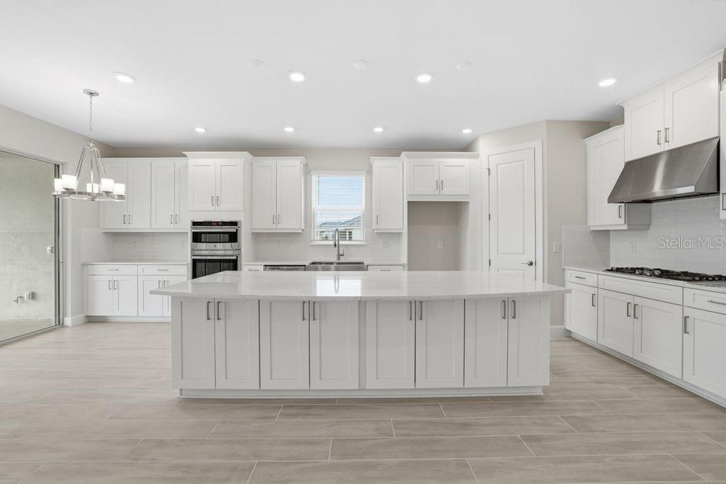 Photo of 3897 Figliolia Way, Wesley Chapel, FL 33543 (MLS # TB8430321)