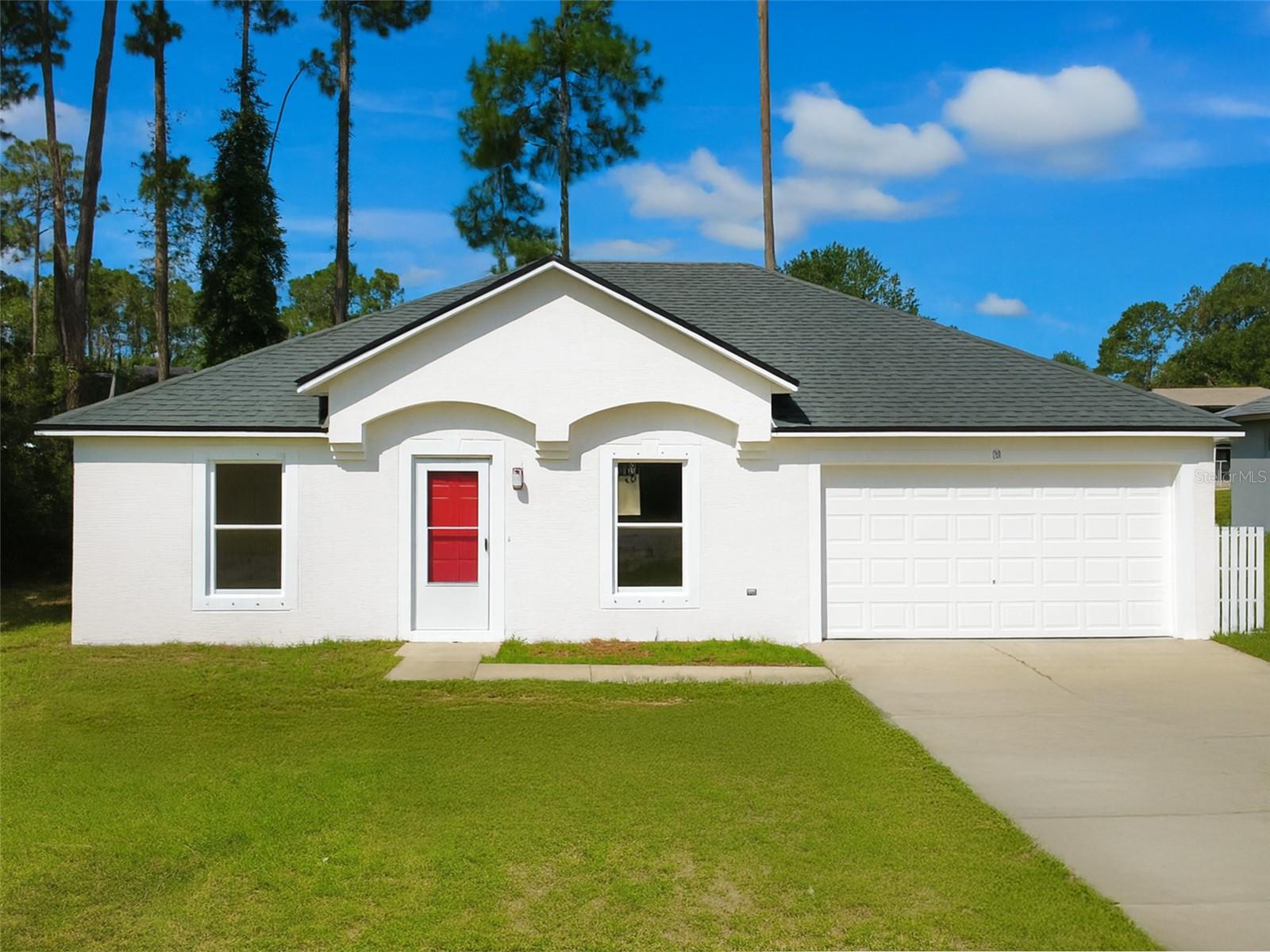 Charming Fully Renovated Home in Prime Palm Coast Location. Discover this beautifully remodeled 3-bedroom, 2-bathroom home nestled in a sought-after area of Palm Coast. Situated on a 0.23-acre lot, this property offers generous outdoor space perfect for relaxation or entertaining guests. Recent updates include a new roof (2023) and air conditioning system (2022), providing comfort, energy efficiency, and peace of mind. The home features a functional open layout, with a kitchen that seamlessly flows into the living and dining areas—ideal for everyday living and entertaining. The spacious primary suite includes a private en-suite bathroom and a large walk-in closet, while the secondary bedrooms has flexibility for guests, a home office, or hobbies. Though some areas may benefit from minor upgrades, the competitive price reflects this opportunity, giving buyers the chance to personalize the space to their unique taste and add long-term value. Enjoy a private backyard oasis with plenty of room for outdoor activities or future enhancements. Conveniently located near shopping, dining, parks, and with quick access to major roadways, this home is a smart choice for anyone seeking comfort, location, and potential. Don’t miss out—schedule your private showing today!