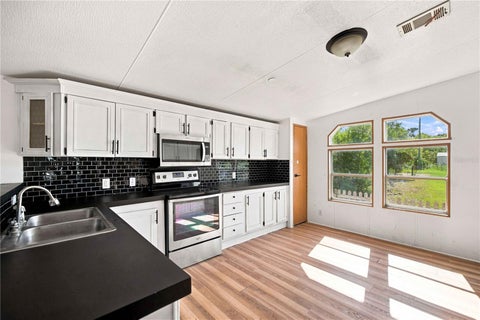 Tiny photo for 2251 SE 136th Avenue, Morriston, FL 32668 (MLS # OM726818)