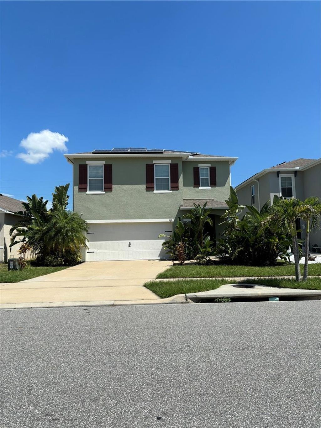 Photo of 160 Eagleview Loop, Davenport, FL 33837 (MLS # O6354960)
