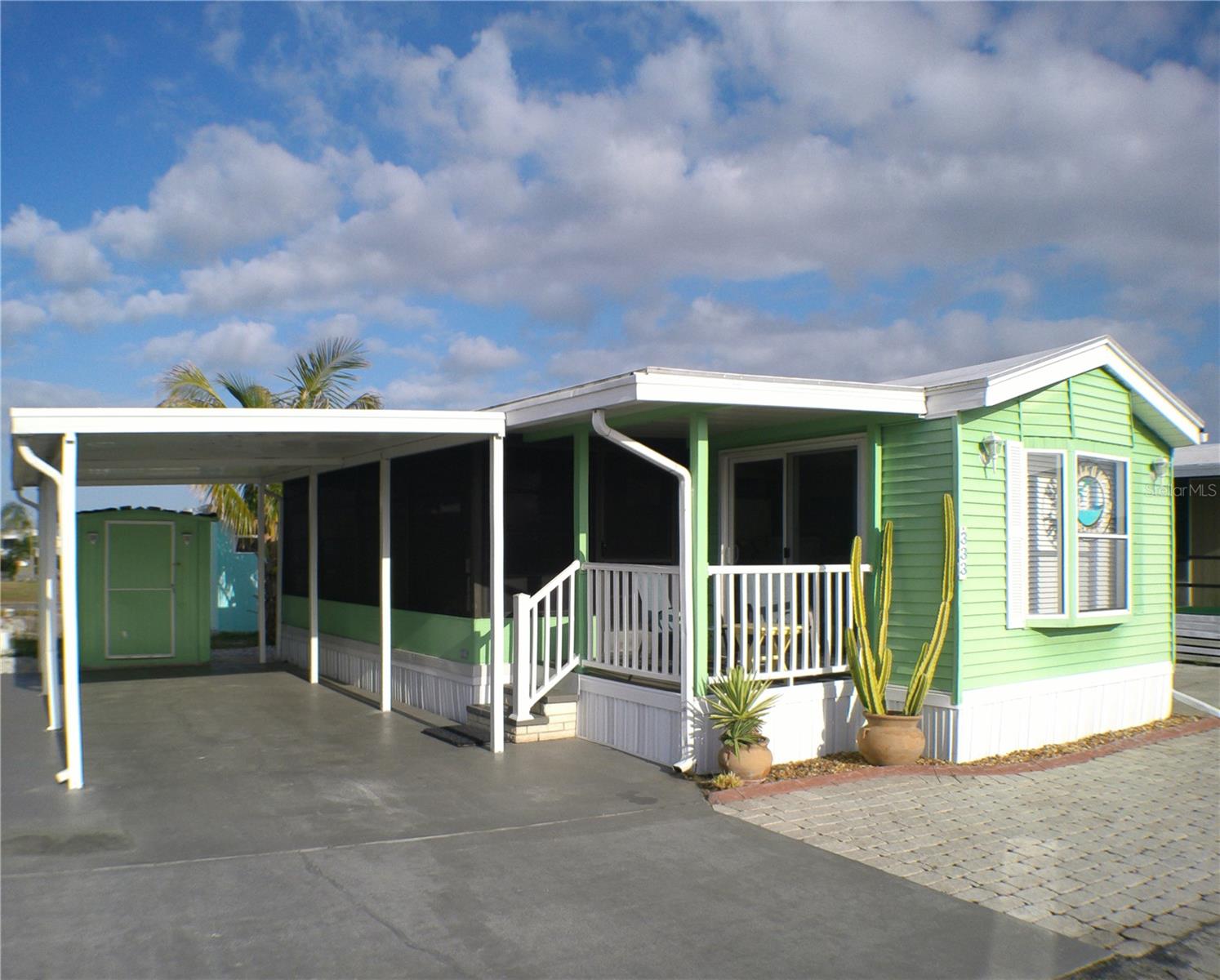 Pick Me!!! Lot 333!!! Located on desirable Ave. I -- my lime green facade you will surely see. Step up 3 steps to the
East/South - facing porch where you can enjoy your morning coffee or afternoon cocktails. Then enter into this adorable 1/1 seaside-themed renovated home. You will appreciate 536 sq. ft living, all on one level. With 3 mini splits this home offers enjoyable, comfortable Florida living at an amazing value. Covered carport and shed with your very own Coconut palm you can see from the bedroom. Fully furnished-turnkey. Tranquility awaits.
This is a must see!!! Come home to Lot #333.