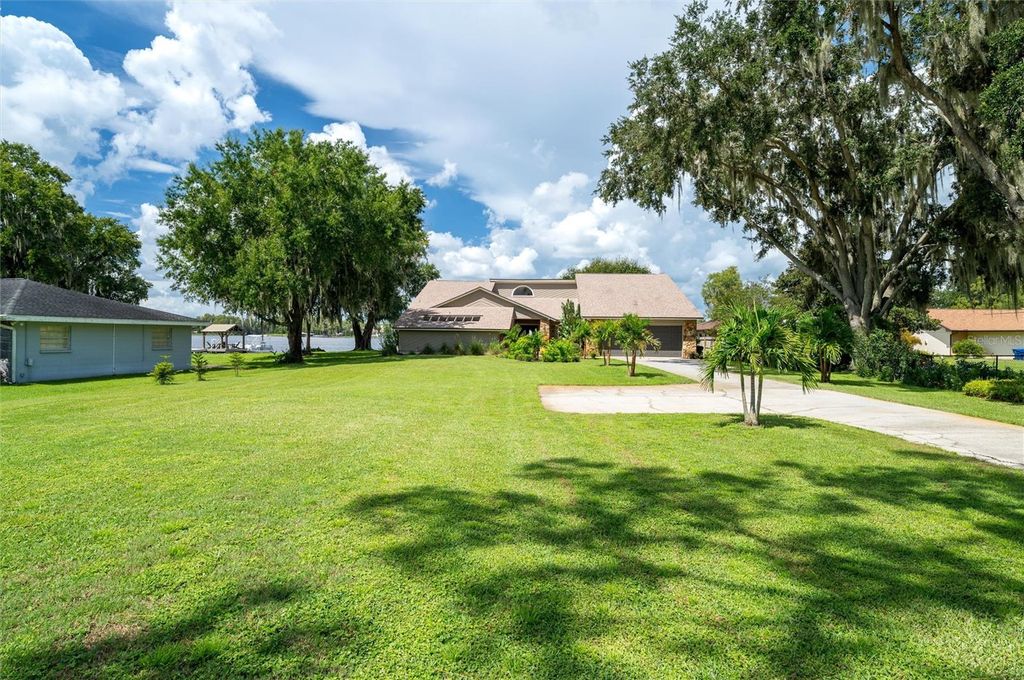 Photo of 3539 Lake Padgett Drive, Land O Lakes, FL 34639 (MLS # TB8406585)