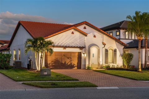 Photo of 10692 Royal Cypress Way, Orlando, FL 32836 (MLS # O6360062)