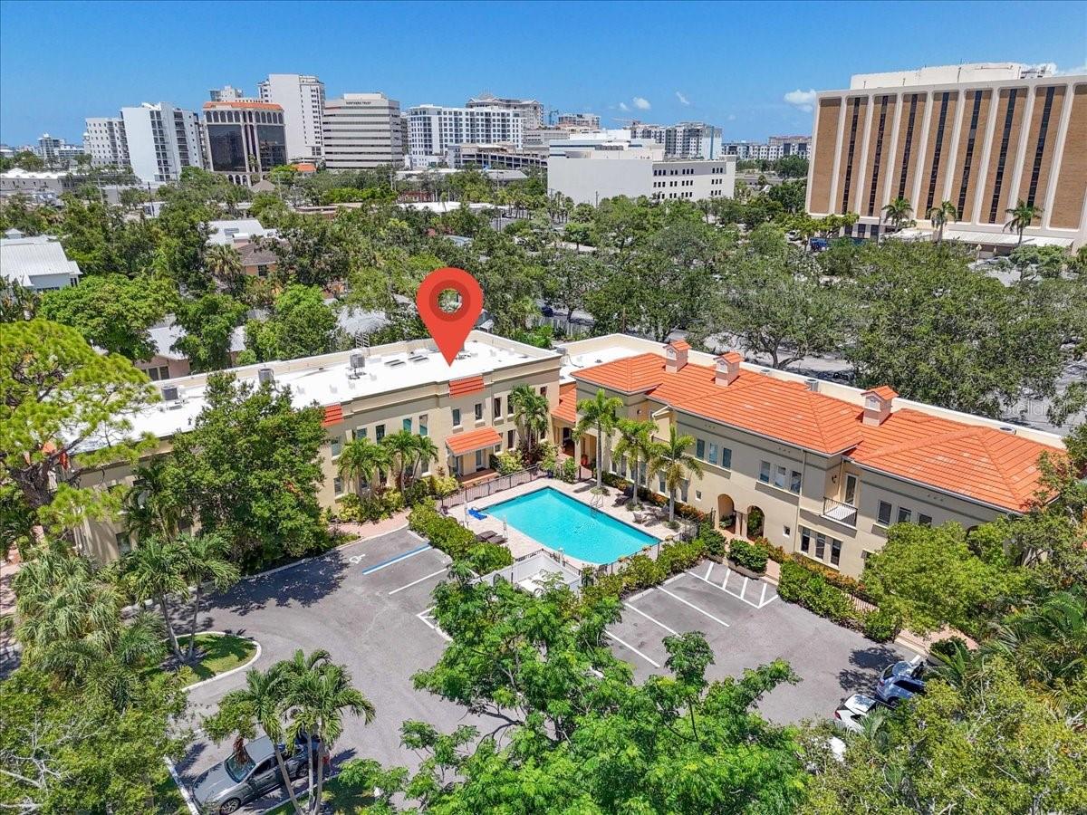 Charming Downtown Sarasota Villa – Laurel Park
Nestled in the sought-after Laurel Park neighborhood, just steps from the excitement of downtown Sarasota, this exquisite villa offers 3 bedrooms, 3 full bathrooms, and a loft-style office. Soaring ceilings and engineered hardwood floors throughout the main living areas create a bright and inviting atmosphere on both levels.
The first floor features a large open great room, perfect for entertaining, with an abundance of windows, a chef’s kitchen with GAS RANGE, granite countertops and stainless-steel appliances, a dining area, under-stair storage, a guest bedroom, and a full guest bathroom. Follow the elegant iron stairwell upstairs to the loft-office space, laundry room, a second full guest en suite, and the luxurious primary en suite. The primary suite boasts a large walk-in closet, stone and glass step-in shower, dual vanity with granite countertop, and a separate water closet. The space is thoughtfully designed and exceptionally spacious.
Additional upgrades include BRAND NEW TILE ROOF, BRAND-NEW HVAC System, a tankless water heater, hurricane impact windows, wireless smart lighting (control from your smart phone), and high-end window treatments throughout.
Enjoy a maintenance-free lifestyle in The Villas on Laurel, a thoughtfully designed community with a courtyard-style layout, mature landscaping, sparkling resurfaced pool, and shared air-conditioned storage.
Laurel Park, named Sarasota’s “Most Charming Downtown Neighborhood,” puts you just steps from Main Street’s eclectic shops, restaurants, Selby Gardens, Burns Court Cinema, and local boutiques. Two designated parking spaces, plus off-street parking provides added convenience.
This rare opportunity to own a private, peaceful retreat in the heart of Sarasota won’t last— Call to schedule your private showing today!