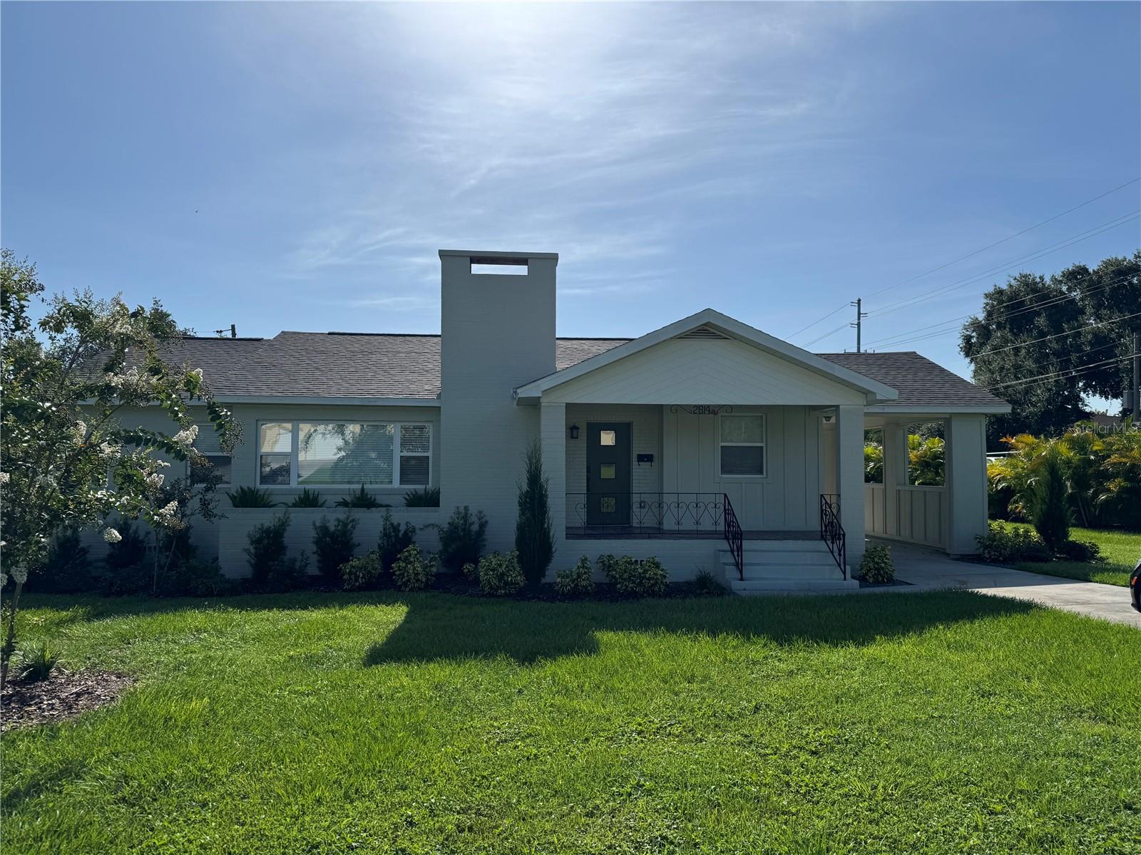 Location, Location, Location! Situated in one of Lakeland’s most desirable neighborhoods—and just steps from beautiful Lake Hollingsworth. This three-bedroom 2 bath residence on one of Lakeland's brick paved streets has been thoughtfully updated while maintaining such character and charm. Recently installed windows invite in plenty of natural light. Original wood floors have been lovingly restored. The kitchen has been completely updated with new stainless-steel appliances beautiful cabinetry and counters. Covered attached carport with side door into the kitchen. One car detached garage and fenced backyard. And let’s not forget the location—just a short walk to Lake Hollingsworth, where you can enjoy peaceful morning walks, weekend bike rides, or simply soak in the beauty of nature right in your own neighborhood. Also close by are Common Ground Park, Cleveland Heights Golf Course, the Lakeland YMCA and so much more. You also have access to shopping, dining and the Polk Parkway to make a commute to Orlando or Tampa a breeze. Schedule a showing today.