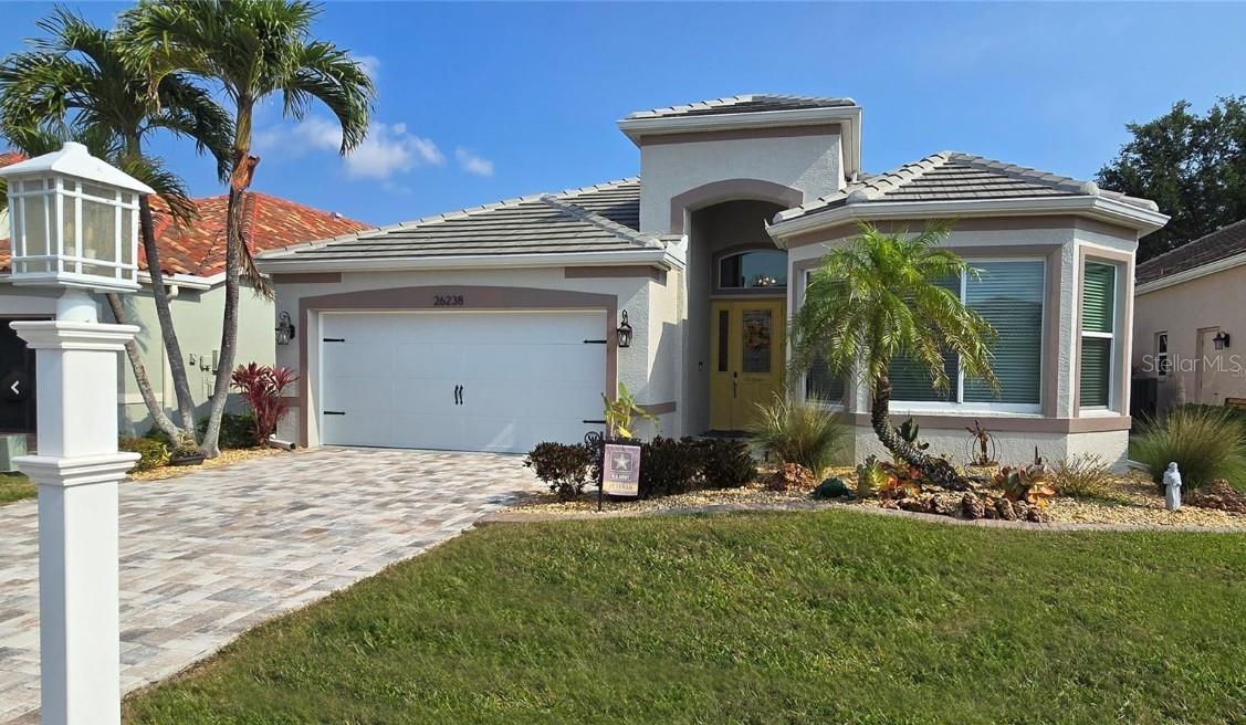 Move-In Ready Luxury in Seminole Lakes
Welcome to your beautifully updated home in the gated community of Seminole Lakes. From the moment you arrive, the inviting curb appeal sets the tone with a cheerful front door, neutral exterior, paver driveway, fresh landscaping, new curbing, and updated lamp post and mailbox. Recent improvements include a hurricane-rated garage door and newer roof, offering peace of mind.
Inside, you’ll find neutral finishes and luxury vinyl flooring throughout. With three bedrooms and two full baths, the home was fully remodeled within the last five years. All windows and sliders are hurricane-rated, and the lanai features two electric storm shutters for added security.
The first guest room near the entry includes a custom double closet and a remodeled bath with quartz vanity—the tub is the only original feature. The second guest room, currently an office, sits across from the formal dining area and adjacent to the main living area.
At the heart of the home is a custom kitchen with rich wood cabinetry, quartz counters, stainless appliances, farmhouse sink, and professional faucet. Pullout shelves, deep drawers, and a built-in bookcase maximize storage and style. Pendant lighting warms the breakfast bar, perfect for casual meals. Off the kitchen, a pantry and well-equipped laundry room add functionality with additional pantry space, quartz counters, washer/dryer, laundry sink, and abundant storage—doubling as a butler’s pantry or staging area when entertaining.
The Primary Suite is a private retreat with his-and-hers custom closets and sliders to the lanai. The remodeled bath features granite counters, dual sinks, custom cabinetry, a comfort-height commode with bidet, and a Roman shower with waterfall tile, rain head, handheld sprayer, and built-in bench.
Outdoor living shines here. The screened lanai with pavers, no-see-um mesh, and dual ceiling fans overlooks the 5th tee and a tranquil lake. It’s the perfect backdrop for morning coffee or evening wine.
Seminole Lakes offers more than a home—it’s a lifestyle. Residents enjoy a Ron Garl–designed 18-hole executive golf course, plus tennis, pickleball, and bocce. With low monthly fees and gated security, the community is one of Punta Gorda’s most sought-after. Just minutes from downtown, US 41, and I-75, you’ll have easy access to shopping, dining, and waterfront attractions while enjoying the peace of a private neighborhood.
This home has been meticulously maintained, with a complete list of updates available for review. Move in and start enjoying the Florida lifestyle you’ve been dreaming of—right here in Seminole Lakes.